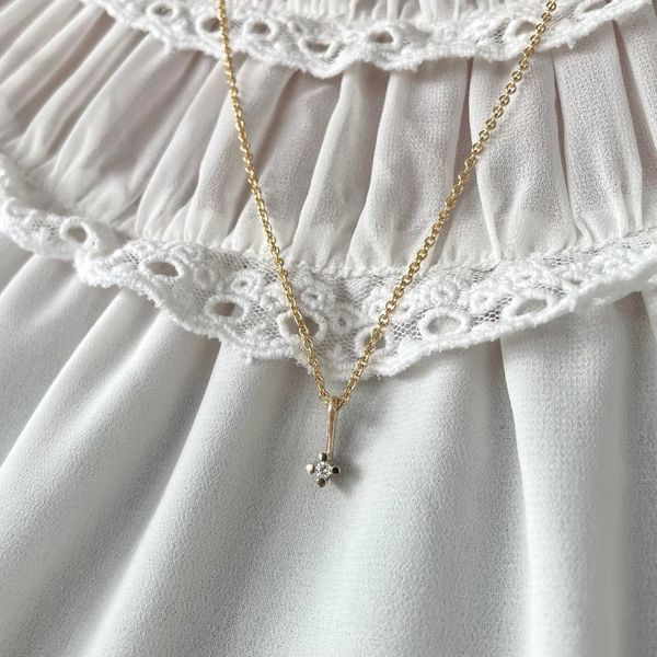 Heiring pendant with 0.05w/vs 14k gold